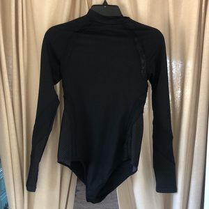 Oysho, black, one-piece, long sleeve, wetsuit.